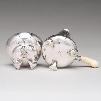 Georg Jensen, a "Blossom" sugarbowl and creamer, Copenhagen 1919-21, 830/1000 silver.