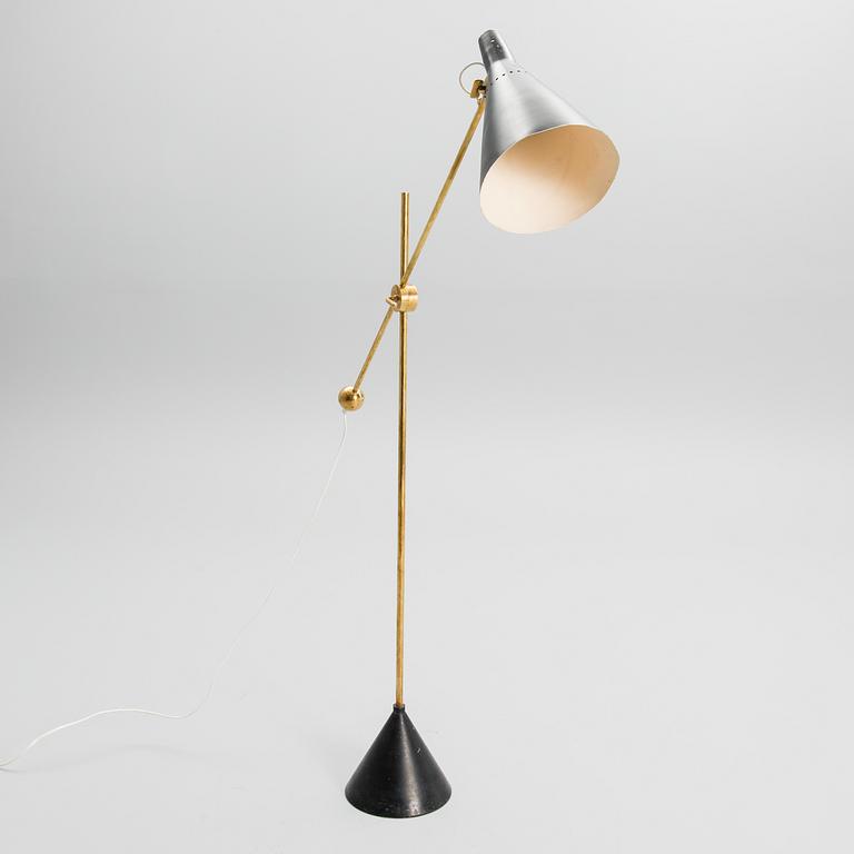 TAPIO WIRKKALA, AN ADJUSTABLE FLOOR LAMP, K10-11. Designed in 1958. Manufactured by Idman Oy.