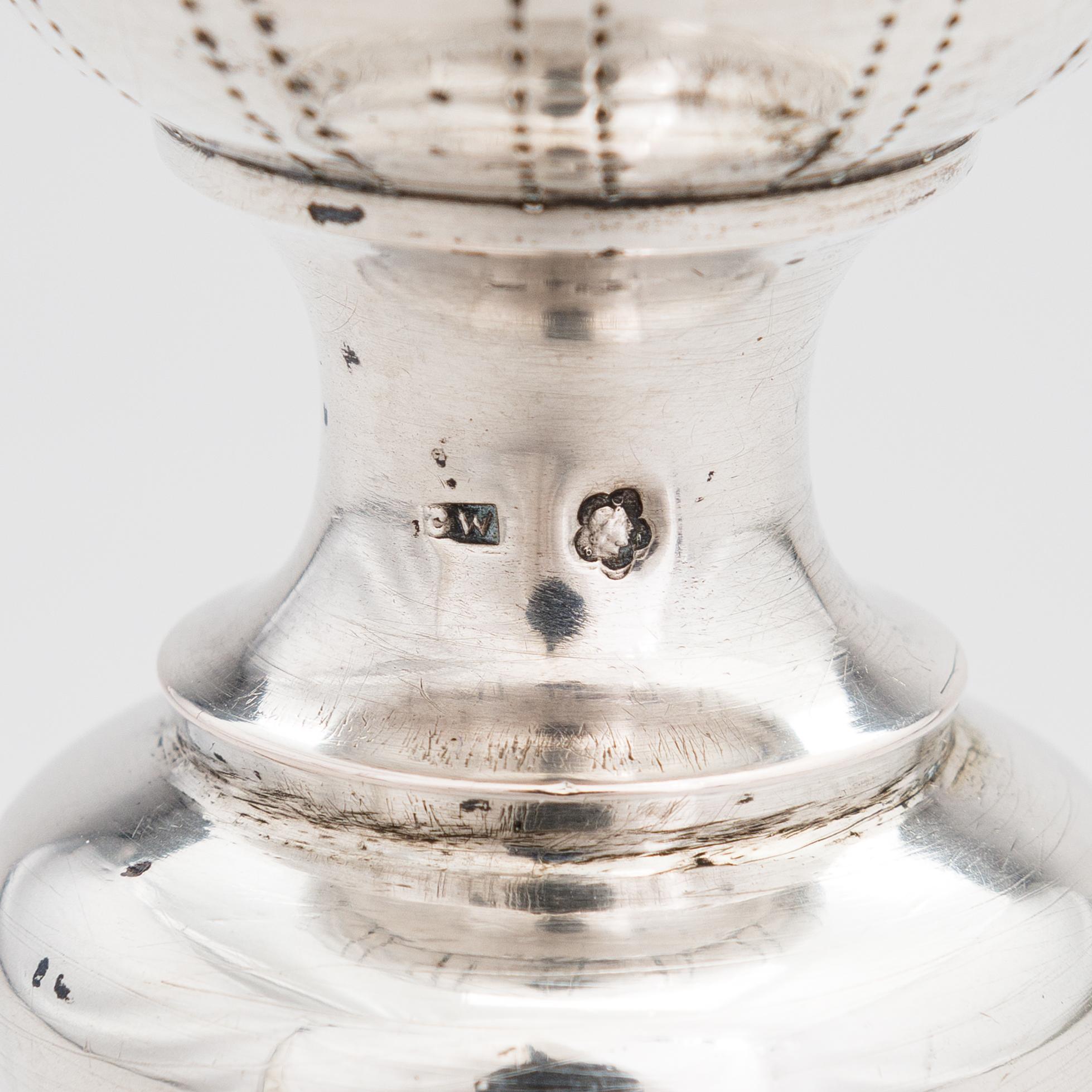 A Viennese silver candlestick, maker's mark CW, Austro-Hungarian Empire 1872-1922.