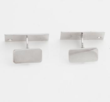 A pair of brilliant.cut cuff links made by goldsmith Gustav Dahlgren & Co.