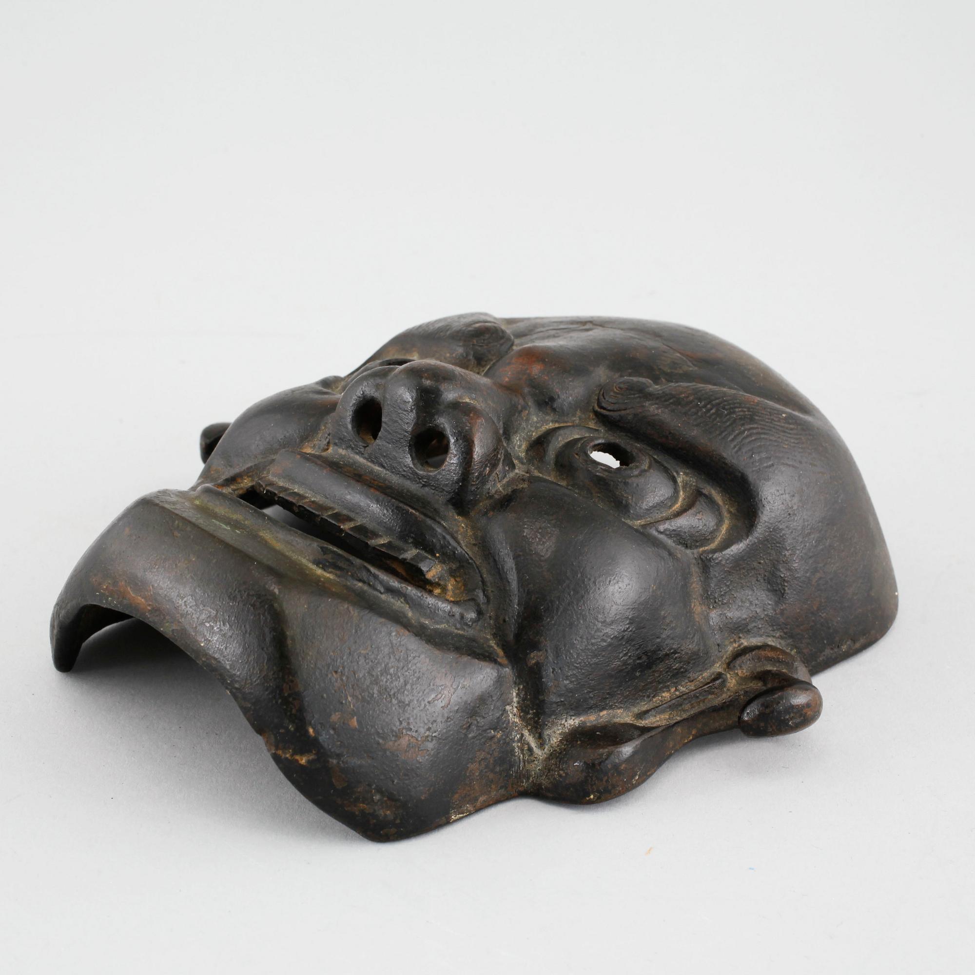 A bronze mask from Japan, Meiji (1868- 1912).