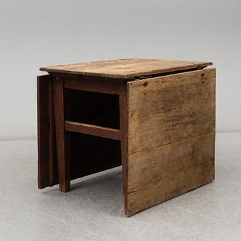 a 19th century gate-legged table.