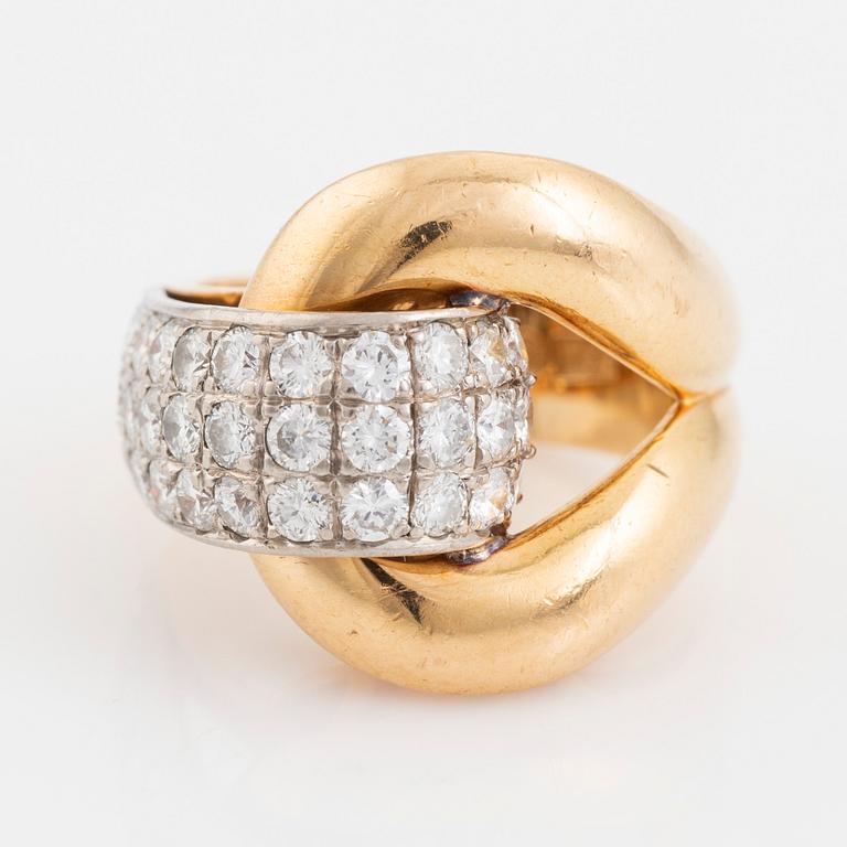 Gold and brilliant cut diamond ring.