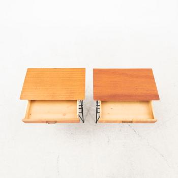 A pair of 1950s teak bedside tables.