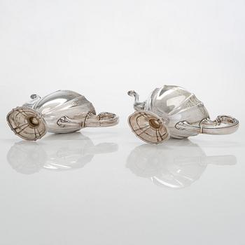 A five-piece sterling silver coffee and tea service, and 12 spoons, USA, first quarter of the 20th century.