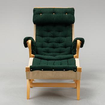 Bruno Mathsson, fåtölj med fotpall, "Pernilla 69", Dux.