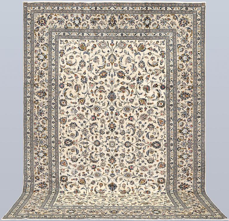 A Keshan carpet, c. 365 x 250 cm.