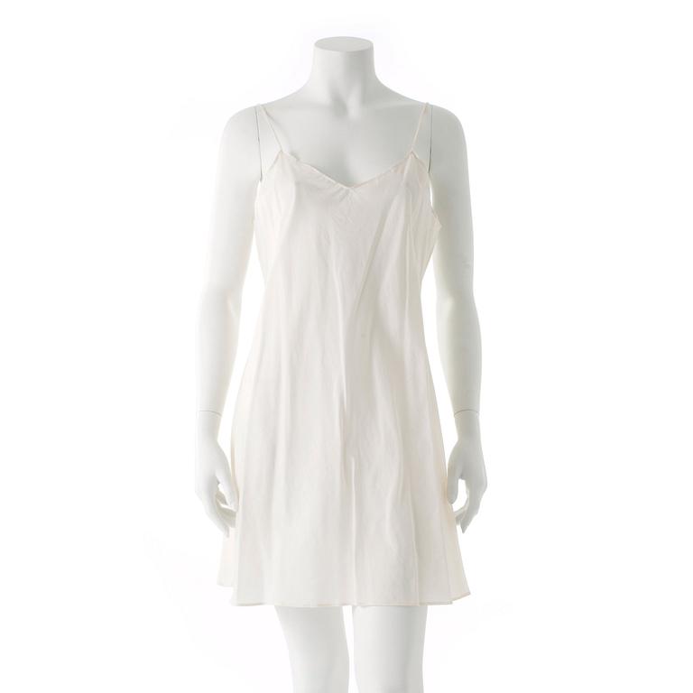 ANNA SUI, a white cotton and embroidered dress.