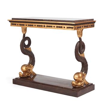 A Swedish Empire porphyry and giltwood console table, early 19th century.