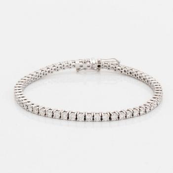 Brilliant-cut diamond tennis bracelet, with report HRD.