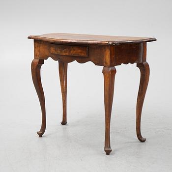 A rococo style side table, from around the year 1900.