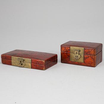 Two lacquered boxes with covers, circa 1900.