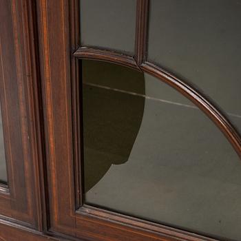 Display cabinet, England, early 20th century.