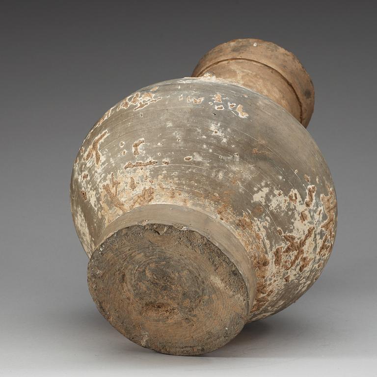 A unglazed jar, Han dynasty, (206 BC - 220 AD).