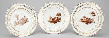 A SET OF THREE PLATES, Two plates and one soup plate.