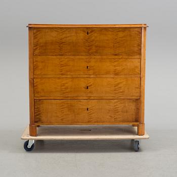 A second half of the 19th century birch veneered chest of drawer.