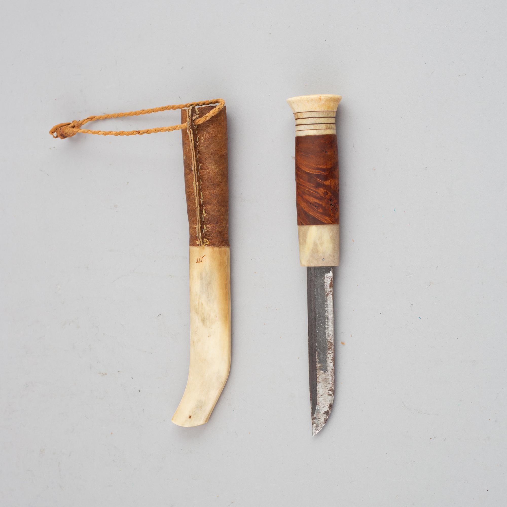 Lars Levi Sunna, a Sami reindeer horn knife, signed.