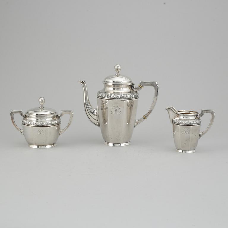 A three pieces silver coffee service from CG Hallberg, Stockholm 1916.
