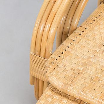 A rattan lounger, late 20th century.