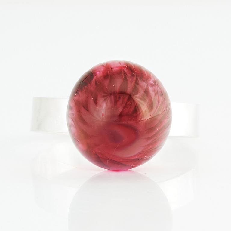 Sigurd Persson, a sterling silver bangle crowned with a strawberry coloured glass ball, Stockholm 1995.