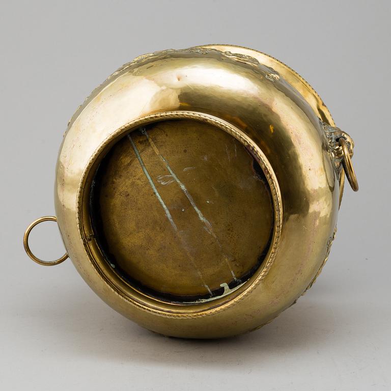 An 18th/19th century brass flower pot.
