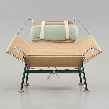 Hans J. Wegner, a 'Flag Halyard' easy chair, Getama, Denmark.