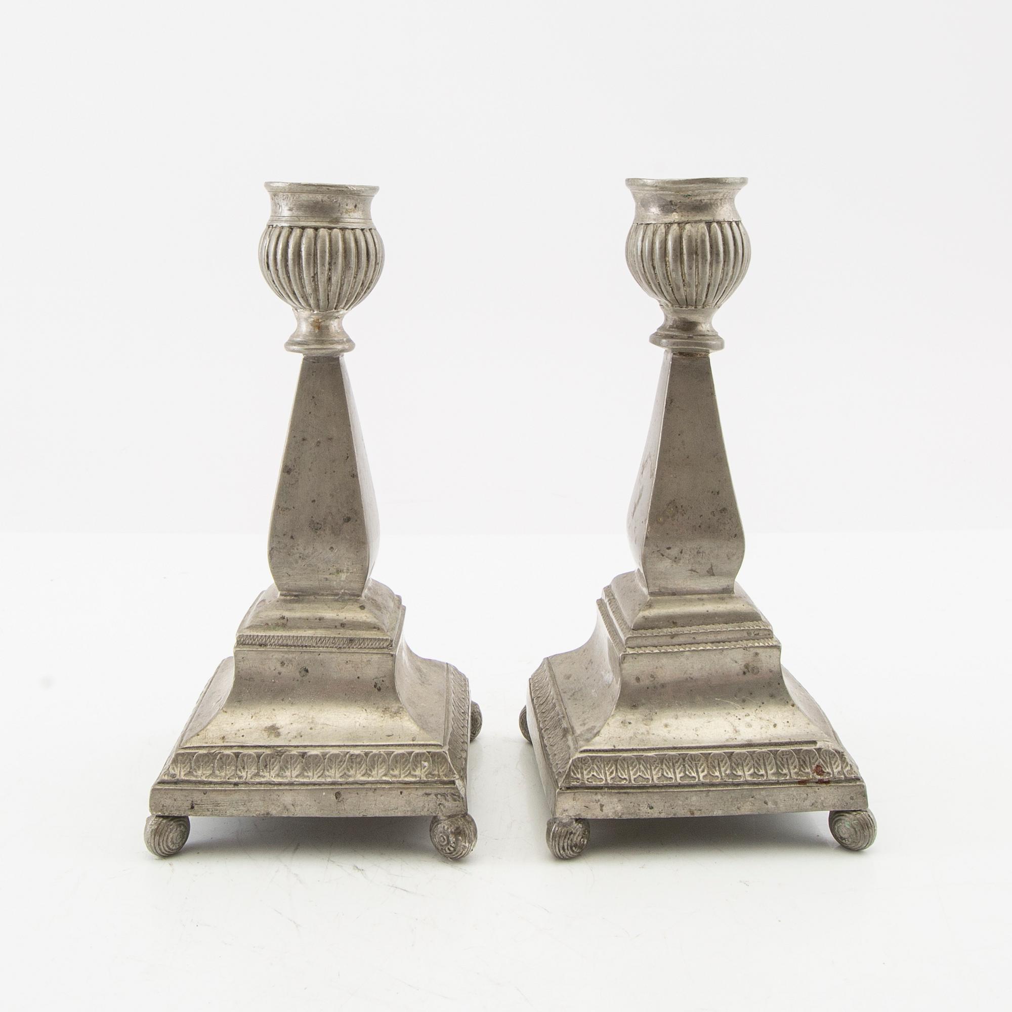 Johan Gottfrid Unger ljusstakar ett par tenn Norrköping 1842.