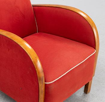 A pair of 1930's/40's armchairs.