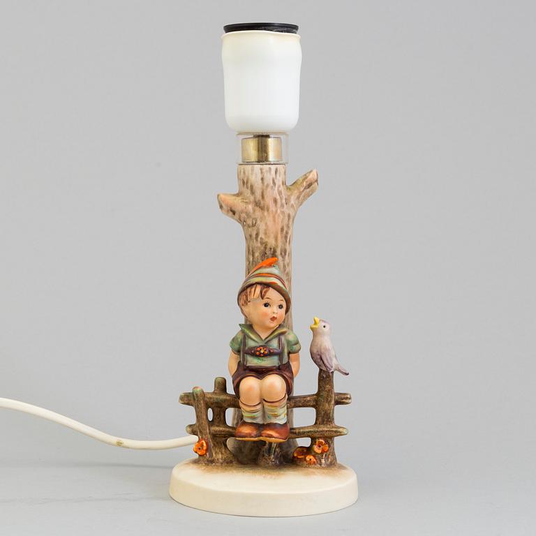 A Hummel porcelain lamp from Goebel, West Germany.