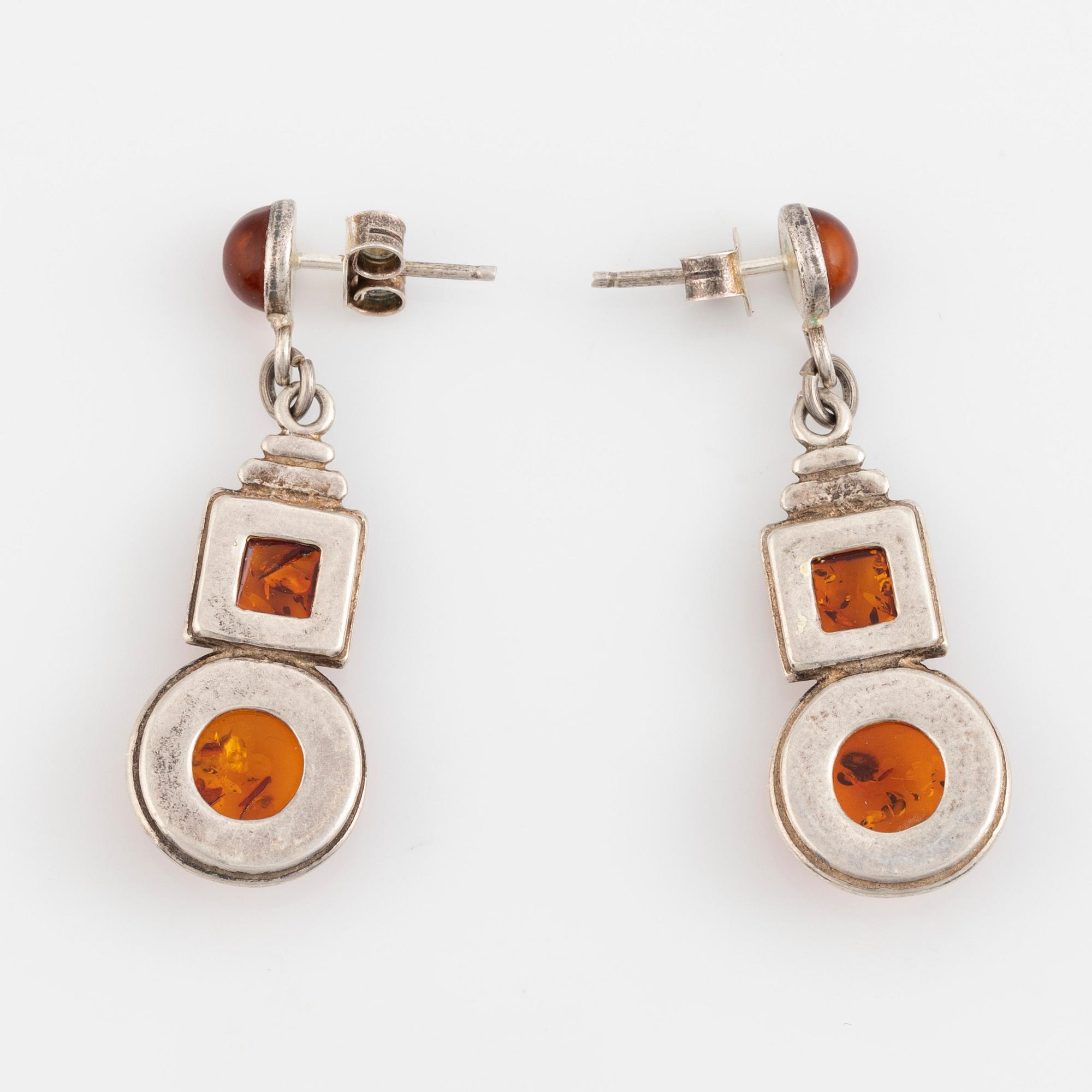 Silver and amber bracelet and earrings.