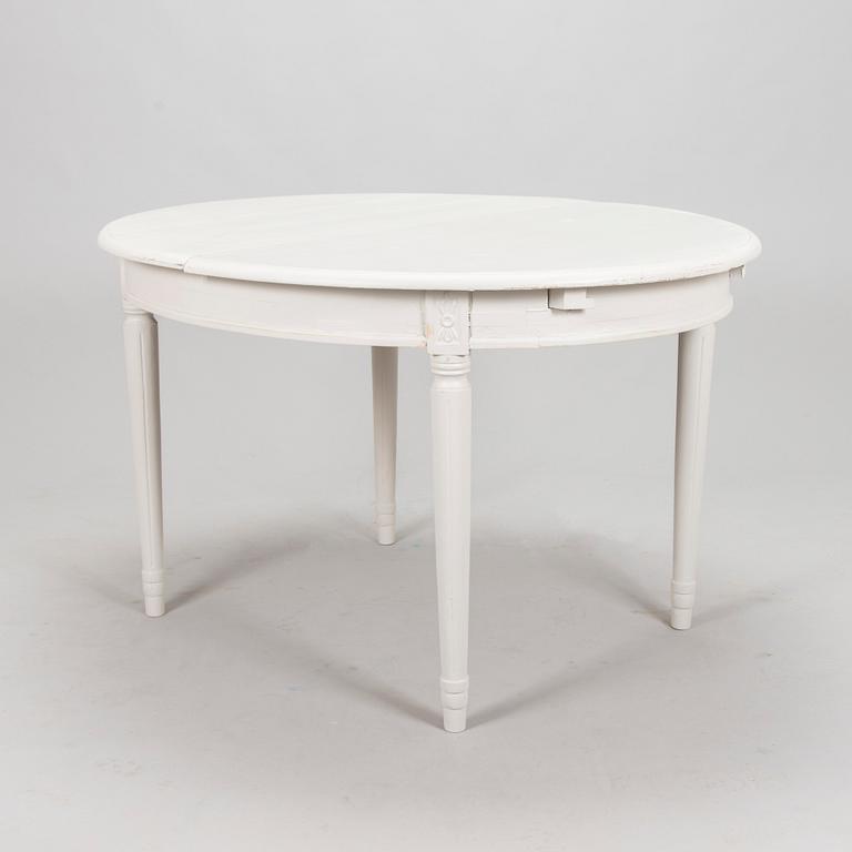 A Gustavian style dining table, mid 20th century.