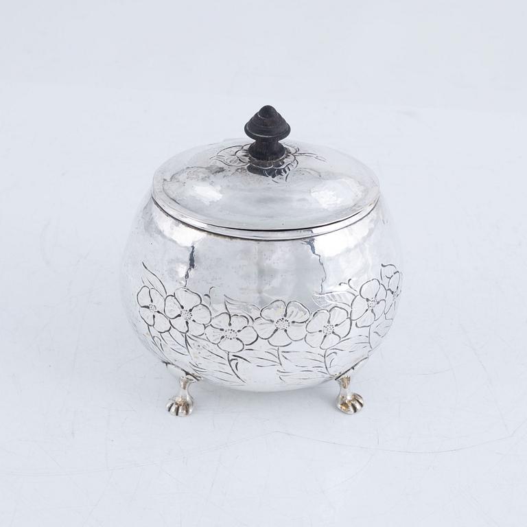 A silver sugar box, early 20th Century.