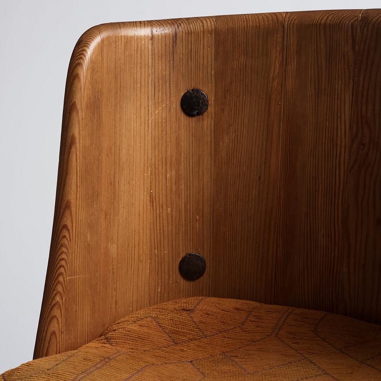 Axel Einar Hjorth, a pair of stained pine 'Lovö' chairs, Nordiska Kompaniet, Sweden 1930s.