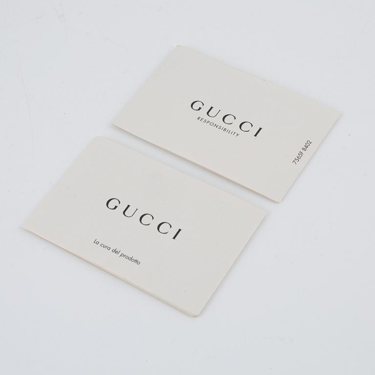 Gucci,