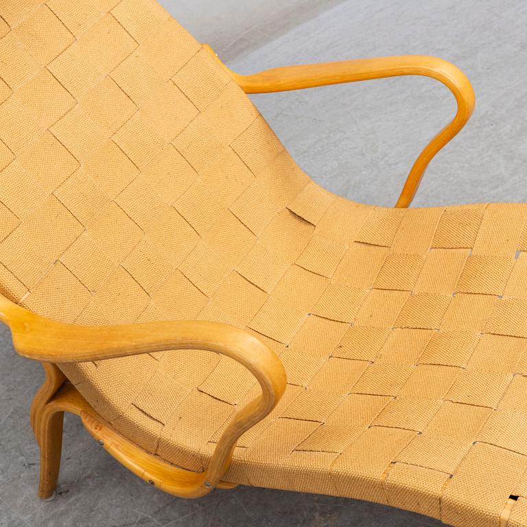 BRUNO MATHSSON, a 'Pernilla' beech recliner from Firma Karl Mathsson, Värnamo, 1980.