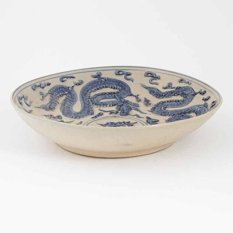 A ceramic dragon dish, Sout East Asia, 20th century.