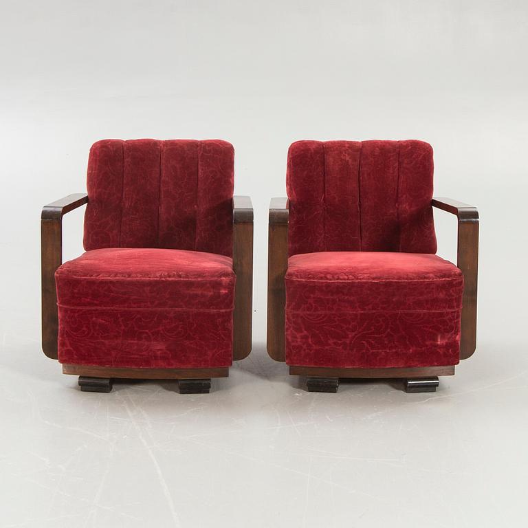 A pair of 1940s easy chairs.