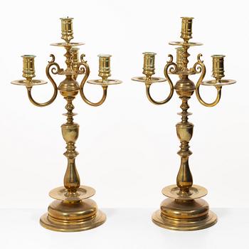 A pair of brass candelabras, Gusums Bruk, Sweden, around 1900.