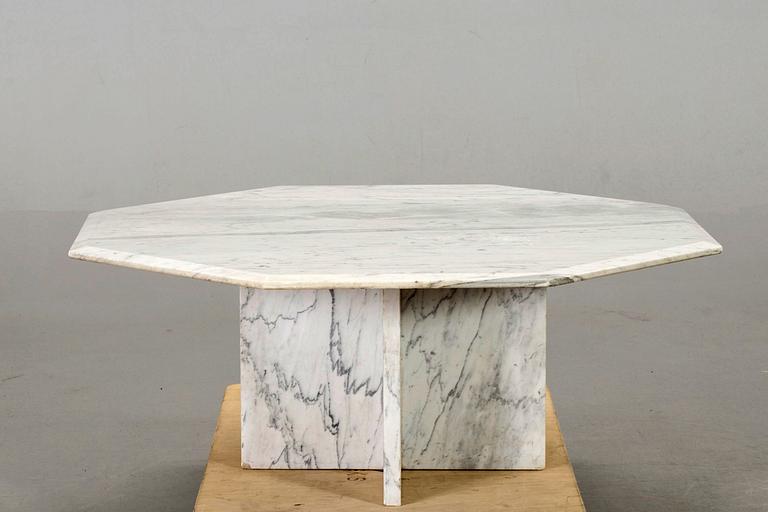 A MARBLE SOFA TABLE.