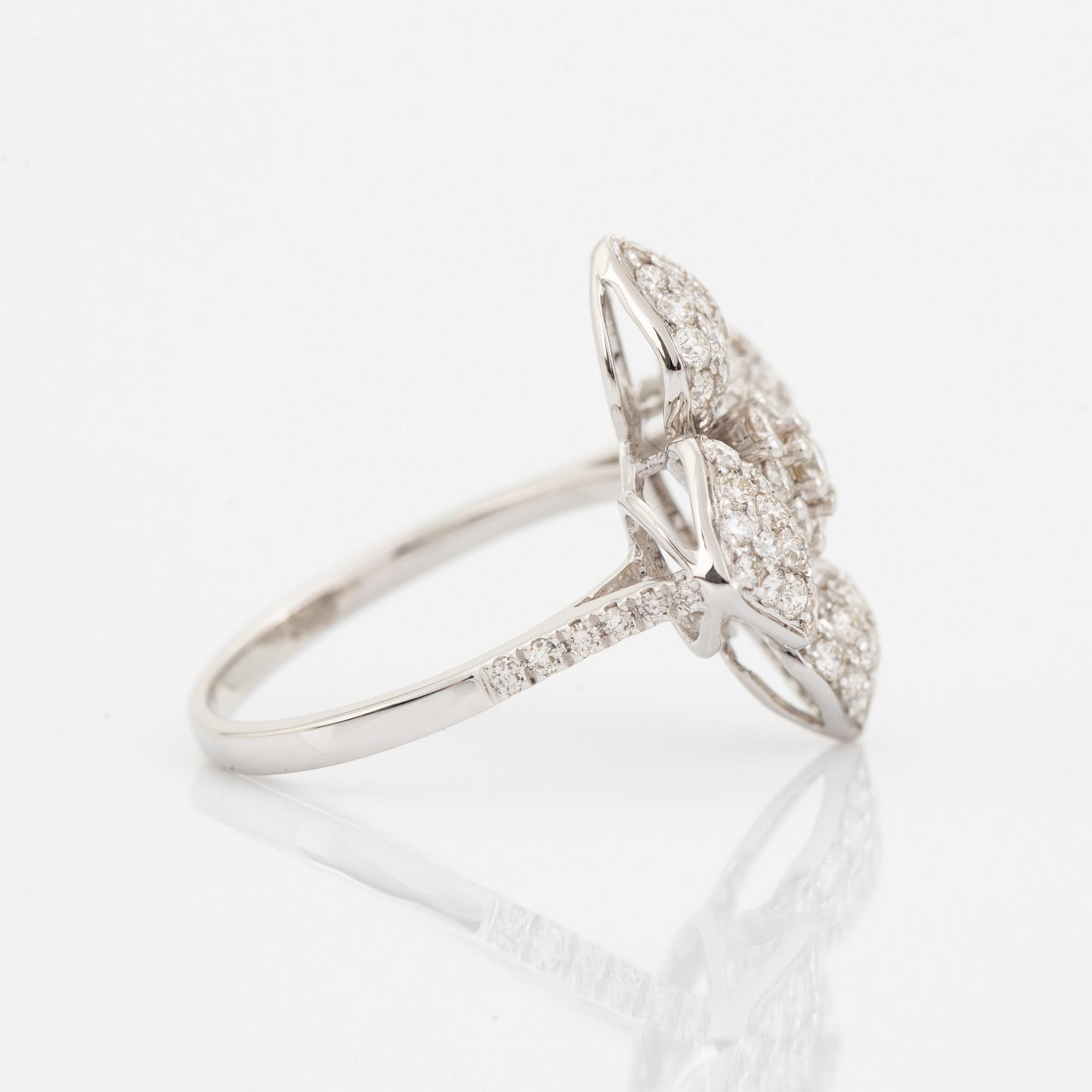 Brilliant cut diamond flower ring.