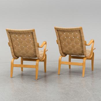 A pair of 'Eva' easy chairs by Bruno Mathsson, Firma Karl Mathsson, Värnamo 1973.