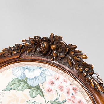 A late 19th century armchair in Rococo style.