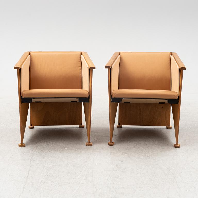 Torbjörn Ahlström, a pair of elm and cherry armchairs.