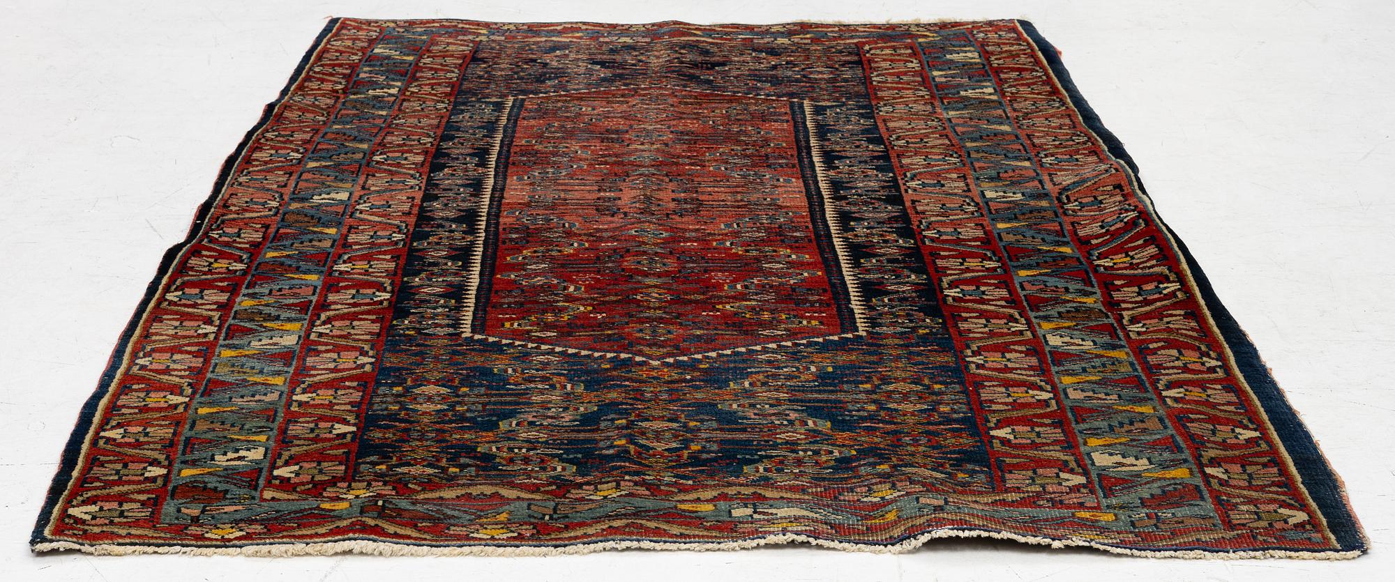 A Sarouk rug, west Persia, c. 197 x 128 cm.
