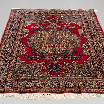 MATTO, a semi-antique Kerman, ca 220,5 x 139,5-142,5 cm.