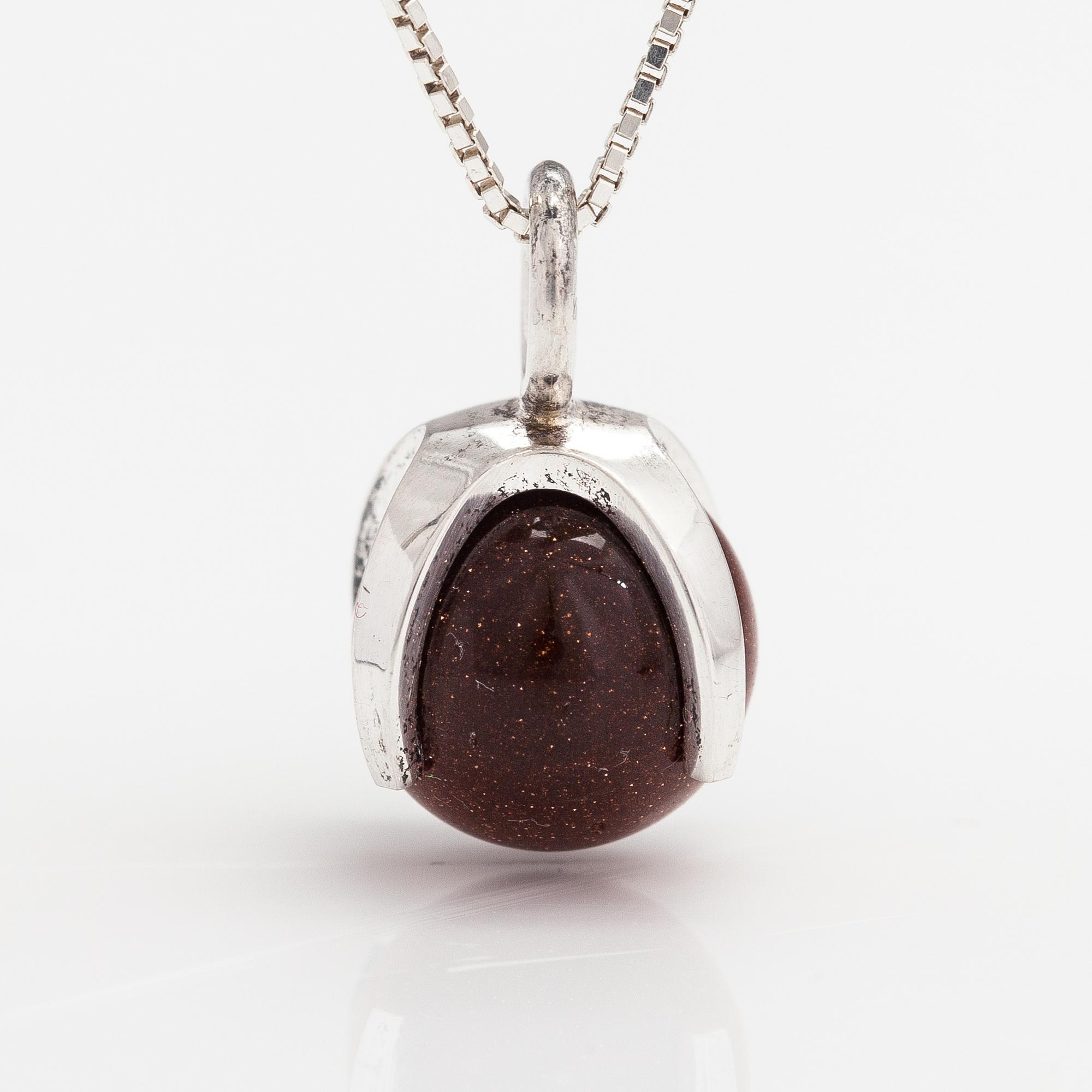 Elis Kauppi, A silver necklace with  a goldstone pearl. Kupittaan kulta, Turku.