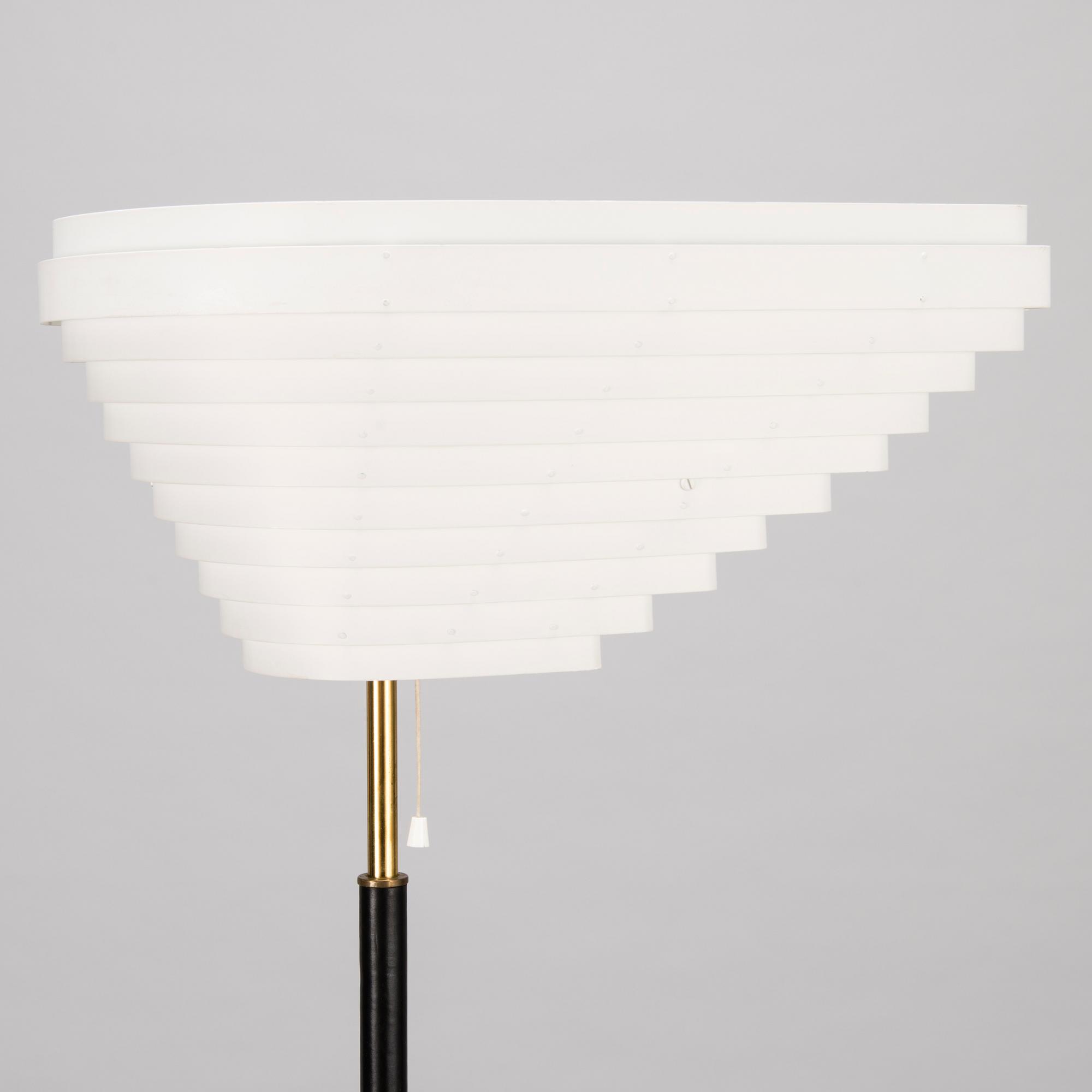ALVAR AALTO, A FLOOR LAMP, "Angel's Wing". Manufactured by Valaistustyö.