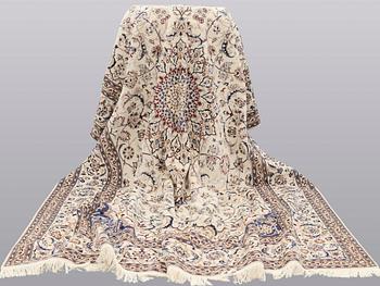 A carpet, Nain part silk, 361 x 262 cm.