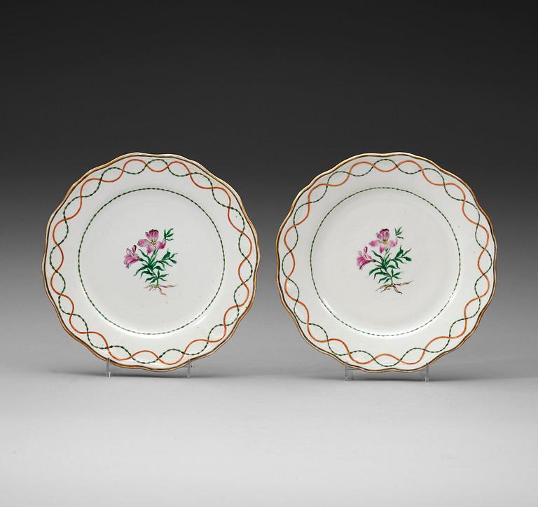 A pair of famille rose armorial dishes for Claes Alströmer, Qing dynasty, Qianlong (1736-95), ca 1770.