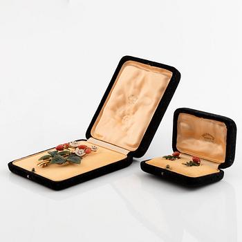 Paltscho en brosch och par örhängen.